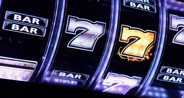 Roulette wheel spinning in live studio with volleyball scoreboard overlay in bottom right corner